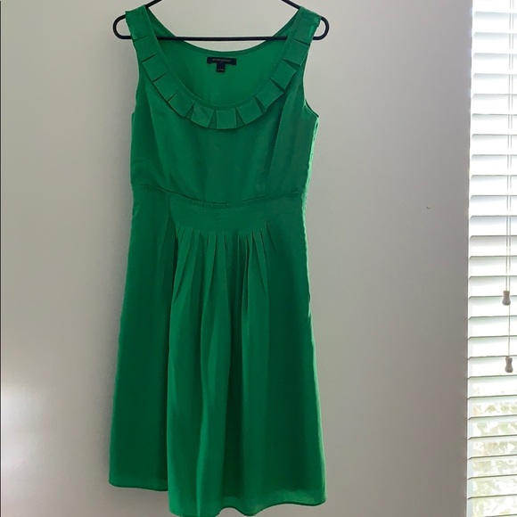 Green A-line dress with front pleats. - Picture 1 of 4